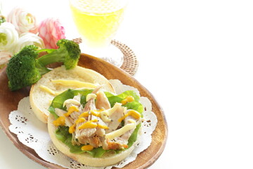 Chicken and mustard sauce in English muffin sandwich for comfort breakfast 