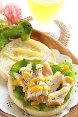 Chicken and mustard sauce in English muffin sandwich for comfort breakfast 