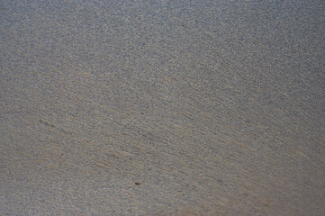 The side of the car body is contaminated with soil and mud