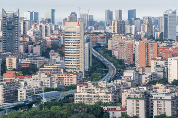 Fototapeta na wymiar Modern city skyline and viaduct, the fast city transportation BRT in Xiamen city, Fujian, Chian