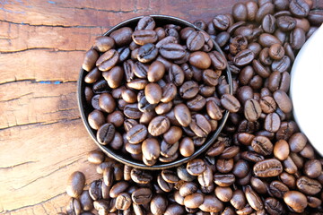 close up coffee beans and macro coffee beans on wood table 
