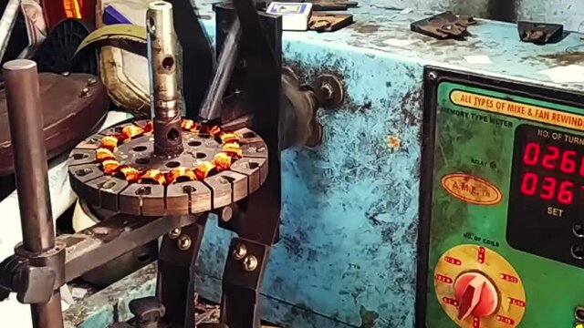 Copper wire coil winding road side petty shop in India