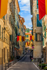 Fototapeta premium Colorful old buildings of a hilltop medieval town of Ventimiglia in Italy across from the French border