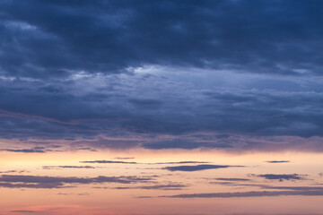 Obraz premium A beautiful, dramatic, evening sky with dark, gray clouds. Backgrounds and textures.