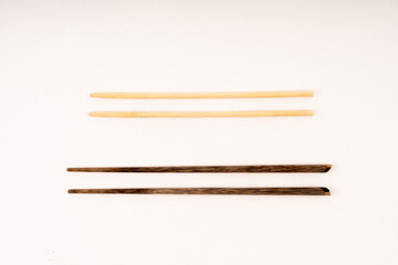 wooden chopsticks on white background