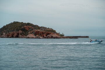 
One island in the middle of the sea which is a tourist attraction of Thailand