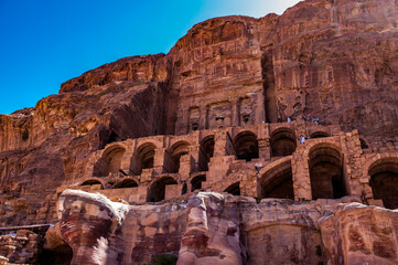 It's Urn tomb in Petra (Rose City), Jordan. The city of Petra was lost for over 1000 years. Now one of the Seven Wonders of the Word