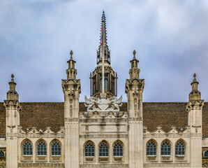 Ornate medieval gothic facade of Guildhall completed in 1440, inscription saying Lord, guide us in London, England