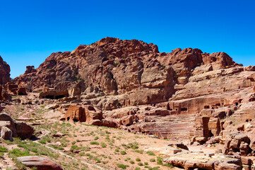 Fototapeta na wymiar It's Rocks in Petra (Rose City), Jordan. The city of Petra was lost for over 1000 years. Now one of the Seven Wonders of the Word
