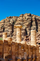 It's Roman columns of the Great temple complex in Petra (Rose City), Jordan. The city of Petra was...