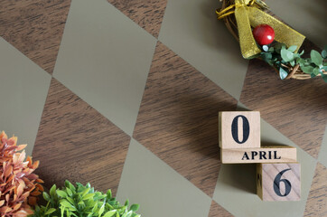 April 6, Date design with number cube.