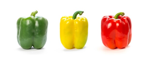 Green, yellow and red bell peppers. Close up. Isolated on a white background