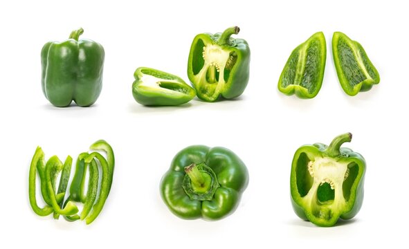 Set of sliced green bell peppers. Close up. Isolated on a white background
