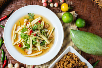 Crispy Catfish Salad on wooden background.