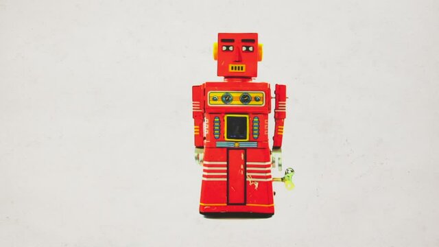 retro robot march forward and fall down 