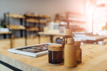 Zero waste shop interior. Wooden counter and shelves with different food goods and personal hygiene or cosmetics products in plastic free grocery store. Eco-friendly shopping at local small businesses