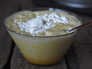 Confectionery background. Stage of cooking biscuit with banana. Cooking a pie of three ingredients.