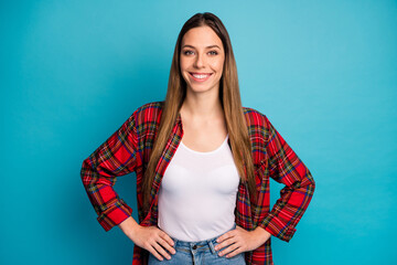 Fototapeta na wymiar Portrait of her she nice attractive lovely pretty charming cheerful cheery content girl model wearing checked shirt isolated on bright vivid shine vibrant blue color background