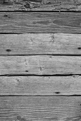 Fototapeta premium Black and white old wood texture background. Old fence. Vintage.