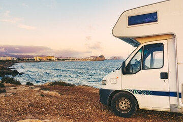 Motor home on sea shore, Spain