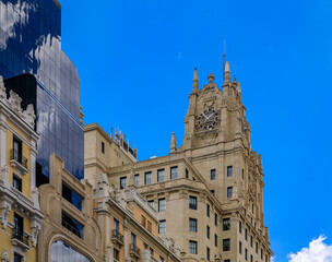 View of Edificio Telefonica and other buildings on Gran Via shopping street in the center of the city Madrid, Spain