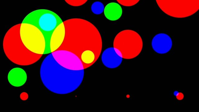 Brightly coloured circle moving and popping on a black background, graphic