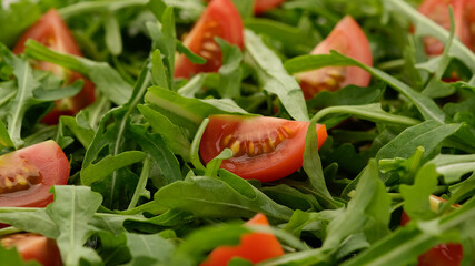 arugula salad with tomatoes top view