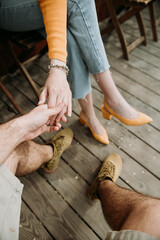 a boy holds hand of a girl