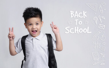 Cute little child with backpack having fun. School concept. Back to School