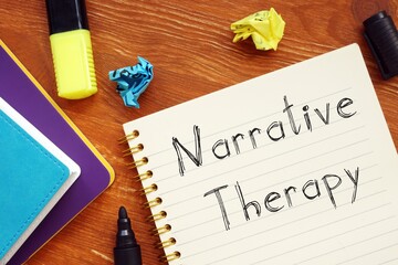 Motivation concept meaning Narrative Therapy with sign on the sheet.
