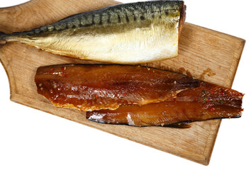 Image of smoked headless fillet of mackerel on kitchen wooden board