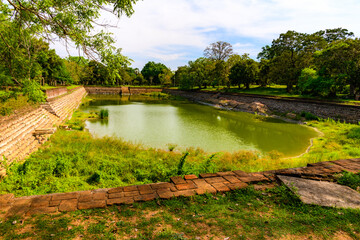 Fototapeta premium Water pool in Anuradhapura, one of the ancient capitals of Sri .Lanka. UNESCO World Heritage