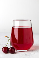 Cold cherry juice in a glass