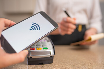 Wireless payment by phone through technology through the terminal for business services