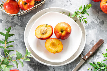 Beautiful juicy nectarines. Ripe farm harvest. Fragrant fruits. Fresh Juicy Organic Nectarines