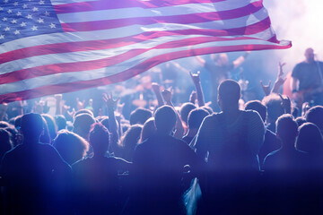 Fototapeta na wymiar United States flag - crowd celebrating 4th of July Independence Day.