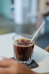 pouring tea into cup