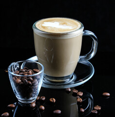 cup of cappuccino with coffee beans