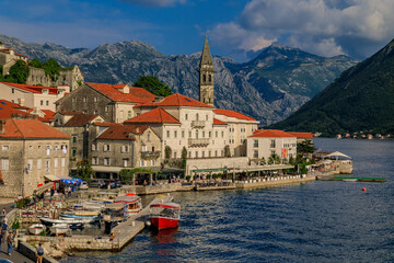 Scenic view of the postcard perfect historic town of Perast in the Bay of Kotor on a sunny day in...