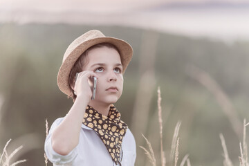 young boy talking on phone