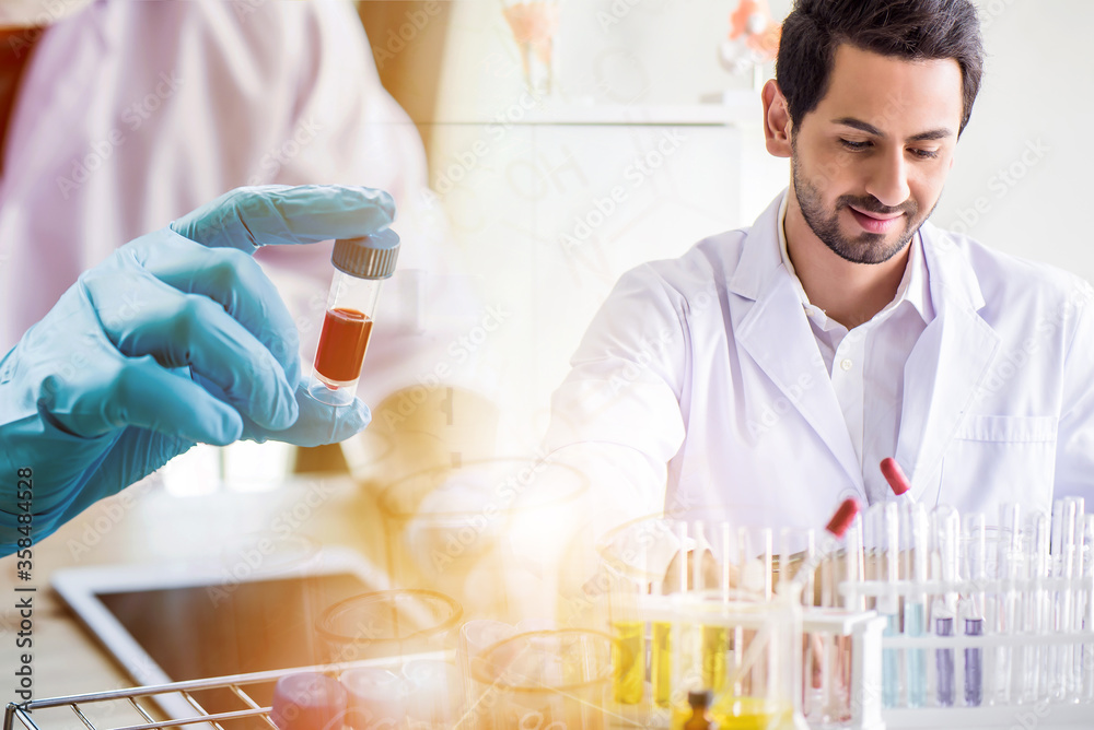 Wall mural caucasian scientist man lab technical service observe liquid sample with lab glassware and test tube