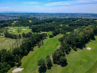 Fototapeta na wymiar ドローンで空撮した夏のゴルフ場の風景