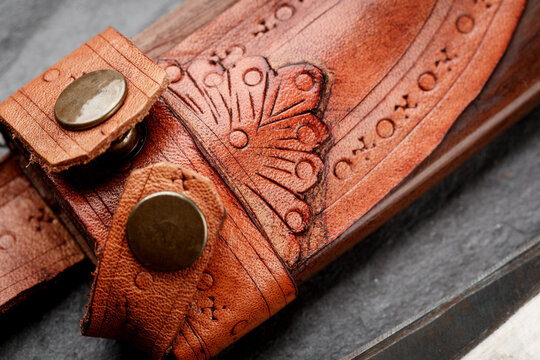 Details of a traditional handmade  balinese knife belakas on a slate background