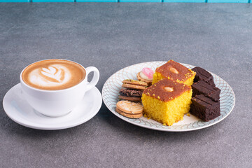 Sfouf, cookies and brownies dessert with cappuccino