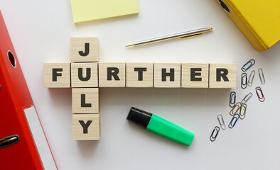 Wooden cubes with words on the office desk.