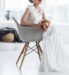 young slender bride in a long white elegant wedding dress. honeymoon ceremony
