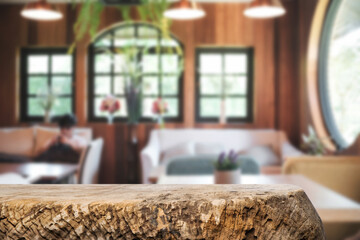 Empty wooden desk space platform and blurred restaurant or coffee shop background for product display montage.