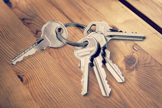 Classic metal keys on keyring on the desk