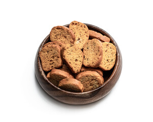 Mini toasts bread in wooden bowl isolated on white background