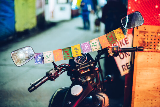 buddhist flags on a motorcycle